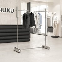 Estante de exhibición de ropa de acero inoxidable brillante para tienda, perchero para abrigos de mujer con colgadores laterales, estante de exhibición tipo isla central de suelo a techo