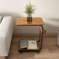 Mesa de centro lateral moderna simple del lado de la sala de estar multiusos para el diseño interior con la rueda