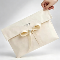 Sac à poussière en coton imprimé OEM ODM, réutilisable, pliable, en toile, avec lien en ruban pour bijoux et vêtements