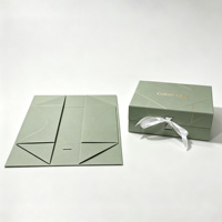 Tragbare Flache Faltbare Starre Geschenkbox mit Blush-Textur, Goldener Geometrischer Prägung, Individuellem Logo und Satinband für Kosmetikverpackungen