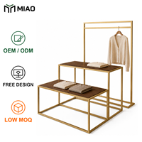 Tables de présentation de vêtements commerciaux avec des arrangements modulaires flexibles pour les aménagements de magasins de détail
