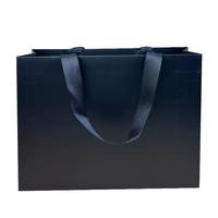 Sacs en papier de carton épais de luxe avec poignée en ruban pour vêtements emballage cadeau sac à provisions logo imprimé