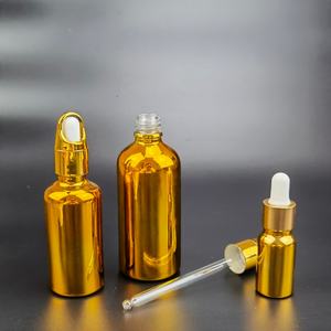 ขวดเซรั่มบำรุงผิวหน้าขนาด 30 มล. แบบกำหนดเอง ขวดน้ำมันหอมระเหยขนาด 1 ออนซ์ ขวดแก้วหยดสีทองเคลือบ UV สำหรับบรรจุสุรา - Product Image 1