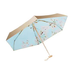 2024新设计创意热卖口袋伞定制印花金色紫外线涂层伞平伞