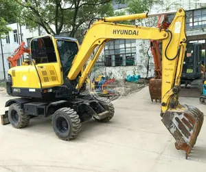 La ruota idraulica dell'escavatore a cucchiaia rovescia da 6 tonnellate attrezzatura pesante Hyundai R60W ha usato gli escavatori gommati Hyundai