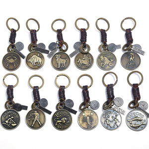 Porte-clés vintage 12 signes <span class=keywords><strong>du</strong></span> zodiaque, pendentif constellation en bronze avec anneau en cuir tressé pour hommes et femmes - Product Image 1