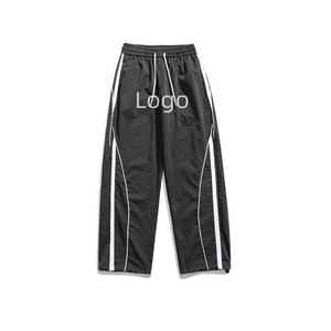 <span class=keywords><strong>Pantaloni</strong></span> all'ingrosso personalizzati da uomo in poliestere <span class=keywords><strong>a</strong></span> rapida asciugatura Streetwear nuovi <span class=keywords><strong>pantaloni</strong></span> da <span class=keywords><strong>paracadute</strong></span> larghi e dritti sportivi da pista Vintage <span class=keywords><strong>pantaloni</strong></span> - Product Image 3