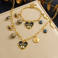 Ensemble de bijoux tendance en acier inoxydable plaqué or 18 carats avec pendentif cœur œil porte-bonheur, collier et bracelet en émail noir
