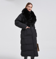 Veste d'hiver longue et brillante noire surdimensionnée coupe-vent pour femmes avec col en fourrure de renard véritable et doublure en duvet d'oie