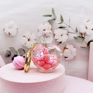 Porte-clés en acrylique avec liquide et <span class=keywords><strong>sable</strong></span>, motif Cinnamoroll chien bleu aux grandes oreilles, jouet en peluche flottant, petit pendentif dessin animé mignon irrégulier - Product Image 6