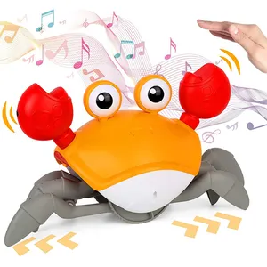 Venda quente Eletrônico Sensing Verde Rastejando Crab Baby Toy com Música Evitar automaticamente Obstáculos brinquedo do bebê