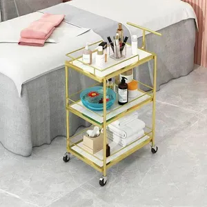 Carritos de lujo para muebles de salón de belleza, muebles de salón de SPA de pelo dorado para uñas, se pueden mover tranvías de belleza giratorios