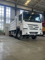 Camion benne d'occasion Sinotruck Howo 375 ch 8x4 à conduite à droite à vendre