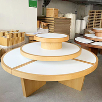 Table de présentation de vêtements en bois à niveaux pour magasin de gros, îlot central de présentation de vêtements avec logo personnalisé