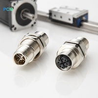 Coupleur traversant M12 X Code CAT6A 10 Gbit/s mâle-femelle à montage sur panneau pour réseaux PROFINET EtherCAT et caméras GigE Vision