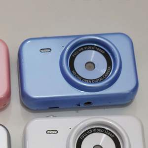 Appareil photo numérique pour enfants HD 2,4 pouces 320x240 avec grand angle 180°, flash, mémoire et trépied pour la photographie L1 - Product Image 6