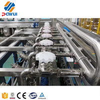 Chaîne de production 3-en-1 haute vitesse 300BPH pour le lavage, le remplissage et le bouchage de barils d'eau de 5 gallons pour usine de production d'eau potable