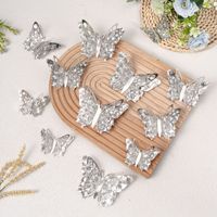 Grenzüberschreitende 3D-Schmetterlings-Wandaufkleber aus Perlmuttpapier, 12-teiliges Set (4 große, 4 mittelgroße, 4 kleine), ausgehöhlt, lasergeschnitten, silberkantig