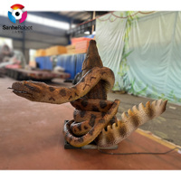 Modèle de serpent animatronique enveloppant un crocodile - Accessoire interactif réaliste pour les expositions de parcs d'aventure et de parcs à thème