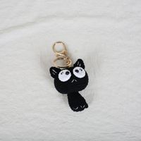 Porte-clés chat noir en peluche fait main au crochet, adorable jouet amigurumi chaton porte-bonheur, breloque pour sac à dos et sac à main, cadeau de la marque Moni