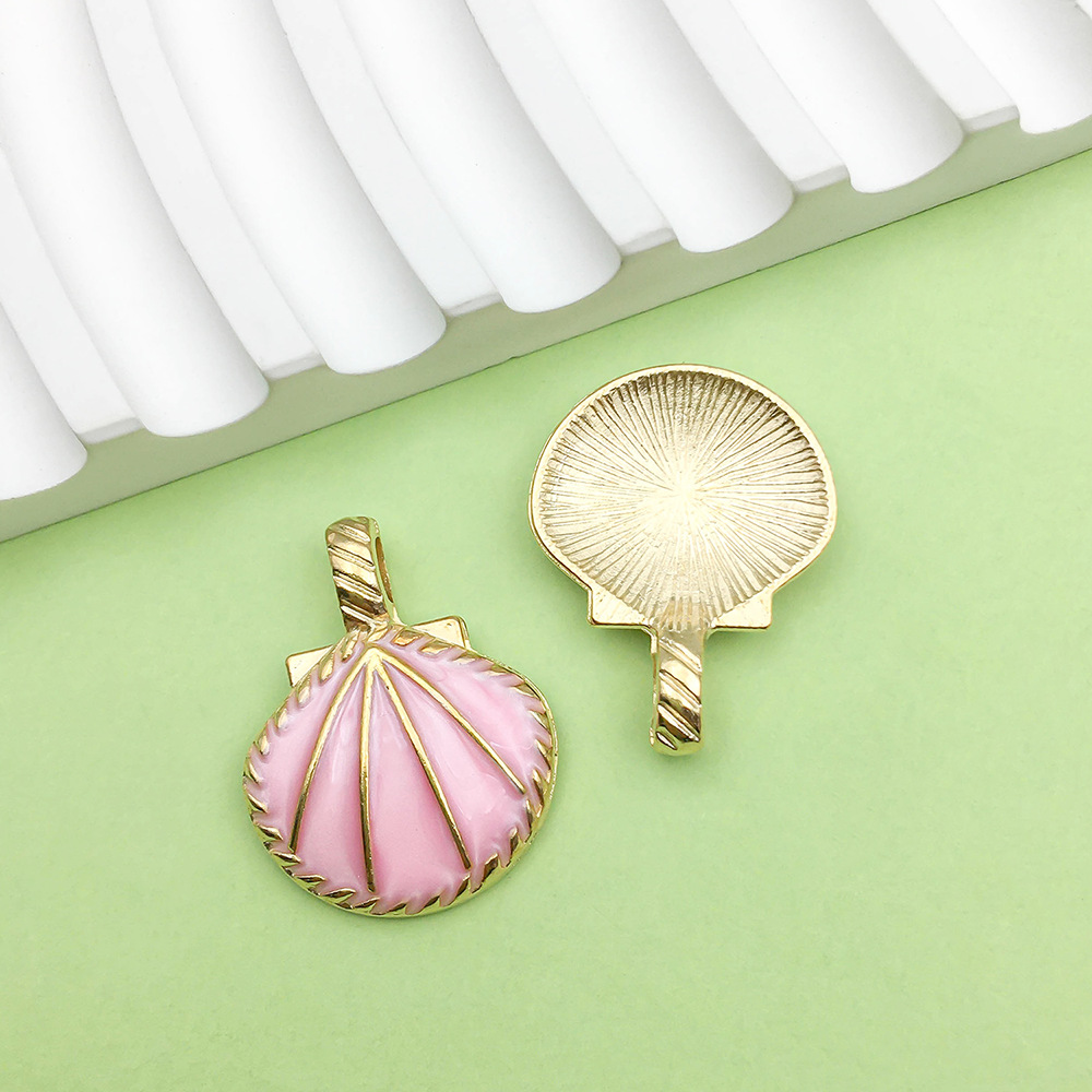 One large pink seashell (20*26mm) - 3g - 12030g