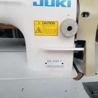 Machine à coudre industrielle à point droit Juki-8700-7 d'occasion en bon état à vendre