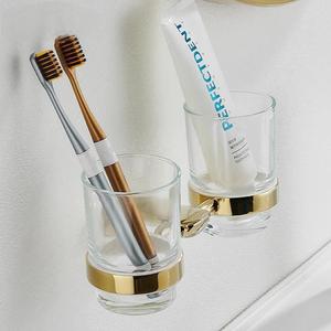 Soporte de vidrio estándar para cepillos de dientes con base dorada, montado en la pared, para almacenamiento de pasta de dientes y cepillos en el baño. - Product Image 1