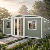 Casa Contenedor Expandible de 40 pies en Verde Salvia, Amueblada, con Plano Abierto, Estructura Blanca, Prefabricada, para Jardín Trasero