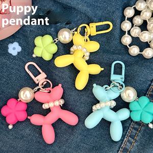 Globo de dibujos animados perro llavero Kawaii colorido suave Pvc auricular caso bolsa encanto accesorios encantador flor perro globo llavero - Product Image 5
