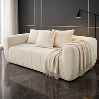 Canapé modulaire 3 places en bouclette blanc crème, éco-responsable, moderne, avec ressorts ensachés compressés sous vide et mousse haute densité