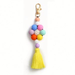 Hot Selling Woven Silicone Carabiner Tassel Keychain with Flower Beads for Women Dog & Panda Pattern Bag Charm Pendant - Product Image 4