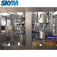 Ligne de production automatique de mise en bouteille d'huile d'olive, machine de remplissage et de scellage d'huile végétale