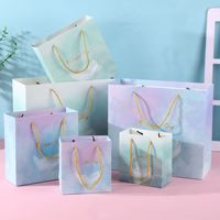 Shaher Luxus Geschenktüte mit Pastell-Farbverlauf, Goldener Kordelzuggriff, Individuelles Himmelsmuster, Kartonverpackung für Boutique-Kleidung