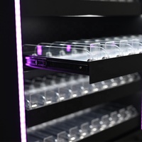 Vitrine métallique moderne APEX avec éclairage LED, boîtier en acrylique et plusieurs rangées de présentoirs en acrylique transparent pour magasin de tabac