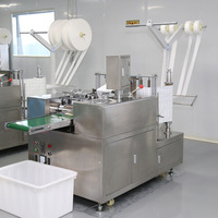 Machine d'emballage automatique pour lingettes alcoolisées avec découpe de tissu non tissé