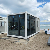 Vie moderne Maisons portables Villa préfabriquée intelligente en acier Chambre à coucher Mur rideau en verre Maison conteneur pour le logement