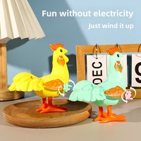 Coq coloré à ressort avec mécanisme d'enroulement - Jouet pour enfants en forme de poussin sauteur