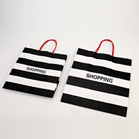 Sac en papier commercial noir blanc de haute qualité avec poignée torsadée Sacs en papier kraft cosmétiques bon marché avec logo imprimé personnalisé