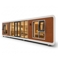 Villa mobile de luxe de 40 pieds en bois grainé, capsule spatiale, hôtel de villégiature, maison préfabriquée, mini-maison