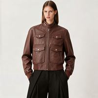 Veste en cuir pour femme en peau de mouton véritable marron uni de haute qualité, coupe ajustée, avec poignets et ourlet côtelés, pour un style urbain audacieux