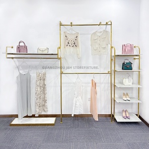 Penjualan terlaris rak pakaian butik emas rak gantungan logam terpasang di dinding rak baju untuk toko ritel - Product Image 5