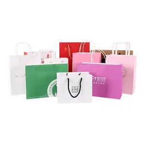 De calidad superior logotipo personalizado impreso bolsa de papel para regalo/ropa de papel de embalaje de bolsa de compras con mango corte
