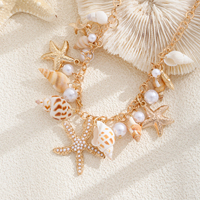 Collier à breloque coquillage doré avec pendentif étoile de mer et perle, chaîne en alliage de zinc, bijou cadeau pour femme, idéal pour les fêtes