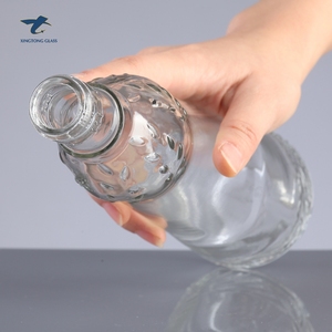 Nuevo estilo de Francia de forma exquisita en relieve 16Oz botella de vidrio para botella de tapa de plástico - Product Image 1