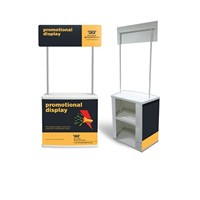 Comptoir promotionnel pop-up robuste et personnalisable pour expositions, salons professionnels et publicité commerciale, avec bannière supérieure