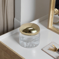 Pot de crème cosmétique en verre écologique de luxe Conception de fond de volcan Nouveau sérum de luxe pour les soins de la peau Crème pour les yeux Caractéristiques Bouteilles en verre