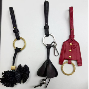 <b>Leather</b> <b>Keychain</b> With Pom Pom Tassel And Jacket Design Carabiner Bag Charm Black Red Irregular Shape Customized Durable - Product Image 1