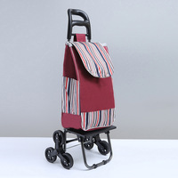 Chariot pratique à quatre roues conception simple OEM personnalisable chariot d'escalier pliable adapté aux personnes âgées pour