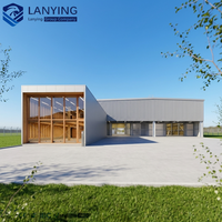 Entrepôt préfabriqué en structure métallique de grande envergure, plafond haut, peinture écologique, conception de baie de chargement efficace