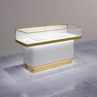 Vitrine de bijoux en matériau MDF de luxe élégant avec éclairage LED Armoire de magasin pour une utilisation dans le centre commercial pour l'affichage de la vitrine
